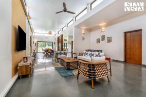 Stayvista at Serenova with big pvt pool and lawn - Your Luxury escape awaits !