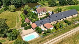 Maisons de vacances Aux Detours de l-Etang La Bergerie et sa piscine privative : photos des chambres