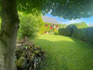 Maisons de vacances Longere 7 personnes - 4 chambres - 3 SdB Orcival : photos des chambres