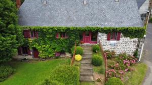 Maisons de vacances Longere 7 personnes - 4 chambres - 3 SdB Orcival : photos des chambres