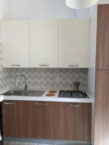 In the center of Modena, Piazza Roma and the Ferrari Museum