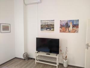 In the center of Modena, Piazza Roma and the Ferrari Museum