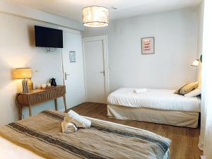 Hotels Hotel Les Chambres de L-Opaline : photos des chambres