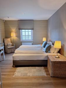 Deluxe Studio room in Casa-Cosi beautiful guesthouses for 1-4p with own kitchen reserved parking and private terrace in shared garden with seasonal pool and sauna minishop available for meals and breakfast or order breakfast basket