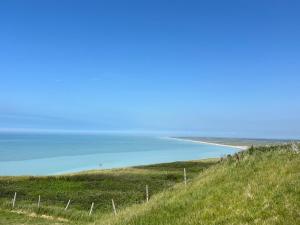 Appartements Le trait de cote vue mer commerces et plage a pied : photos des chambres