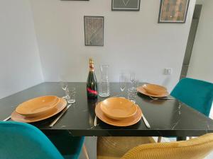 Appartements Romance sur les Remparts - Route des Vins : photos des chambres