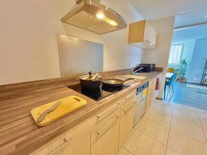 Appartements Romance sur les Remparts - Route des Vins : photos des chambres
