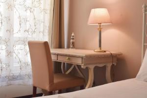 Camera Tripla Economy con Bagno in Comune