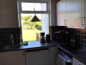 Rent og charmerende hus lejlighed