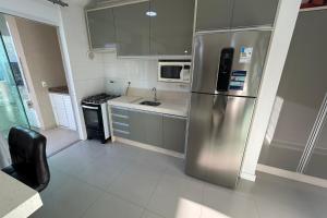 Cobertura com 03 dormitórios