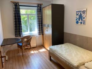 Dörpshus im strandnahen Bojendorf