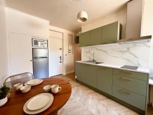 Appartements Casamea - Studio Jardin, Elegant, Clim, Renove : photos des chambres