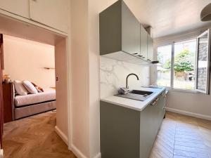 Appartements Casamea - Studio Jardin, Elegant, Clim, Renove : photos des chambres