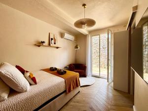 Appartements Casamea - Studio Jardin, Elegant, Clim, Renove : photos des chambres