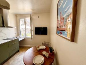 Appartements Casamea - Studio Jardin, Elegant, Clim, Renove : photos des chambres