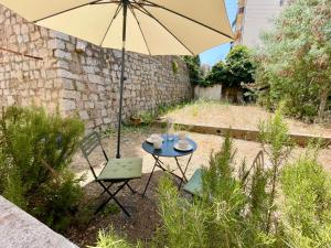 Appartements Casamea - Studio Jardin, Elegant, Clim, Renove : photos des chambres