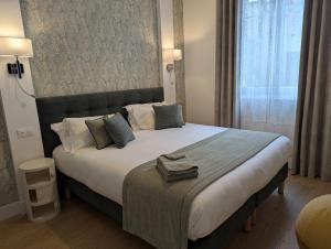 Appartements VENI VEDI VICHY climatise, 50m2 coeur de ville : photos des chambres