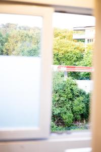 Appartement sous toit lumineux avec garage et 4 pièces en enfilade