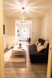 Appartement sous toit lumineux avec garage et 4 pièces en enfilade