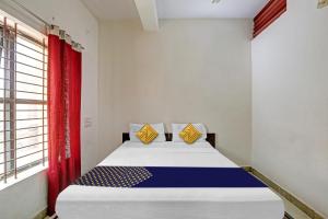 Hotel O Vishu Moni Residency