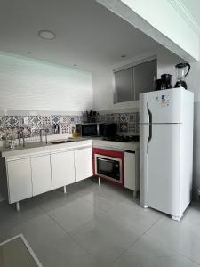 Casa com piscina a 70 metros do mar