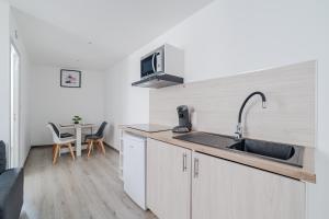 Appartements Sejour Cosy - Proche Gare & Centre - Futuroscope 3 : photos des chambres