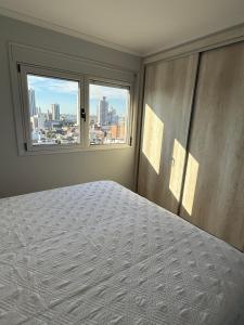 DEPARTAMENTO NUEVO CENTRICO 1Dormitorio COCHERA GRATIS PISCINA