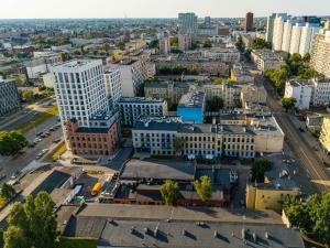 Work & Rest Apartment by Fengshui4u, cowroking, siłownia