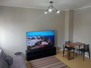 Studio Cinema Smart 75 pol mais Local e Vista espetacular