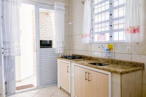 Ampla casa com 04 quartos para locação - 0315