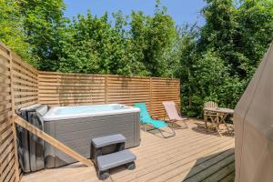 Appartements Le Nid d'Eliyah, suites avec jacuzzi 15min Disneyland Paris : photos des chambres
