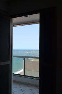 Flat encantador com vista para o mar