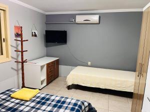 Apzito Tri com garagem