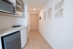 Stylish 1-BR Oceanfront Condo with Panoramic Views