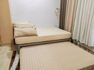 Homey-feel with Balcony Steps to Festive Walk ICC Megaworld