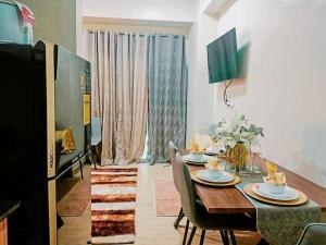 Homey-feel with Balcony Steps to Festive Walk ICC Megaworld