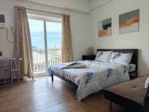 Cozy condo unit at Amani Grand Near Cebu Airport
