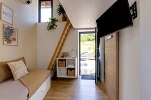 Maisons de vacances La Chambrote - Maison cosy avec spa privatif : photos des chambres