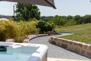 Maisons de vacances La Chambrote - Maison cosy avec spa privatif : photos des chambres