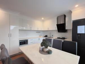 Family Haven in Sunnybank with 2BR 2Bath 3 Beds