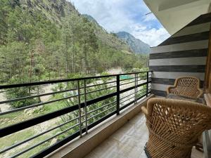 Hotel Mid Orchard Kasol l River Side -Pure Veg Hotel