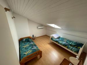 Appartements Demi maison avec terrasse et jardin 3 chambres 6 pers : photos des chambres