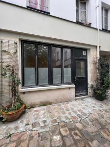 Studio lumineux sur cour à Bastille