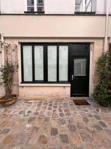 Studio lumineux sur cour à Bastille