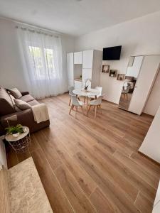 Aqua Family Apartments - Appartamenti con spiaggia, piscina, parcheggio e bici incluse