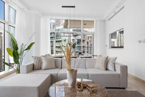 Luxury 4BR w Marina Views Near Beach & Mall