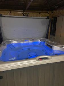 Maisons de vacances Maison spacieuse et climatisee avec jacuzzi : photos des chambres