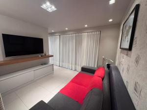 Apartamento com Piscina no Centro e a poucos metros do mar de Torres -RS