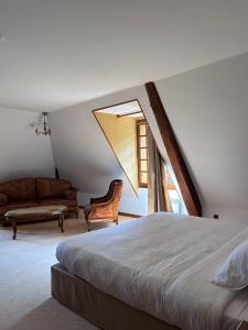 Maisons d'hotes Happy Shelter au Chateau d-Herbelon : photos des chambres