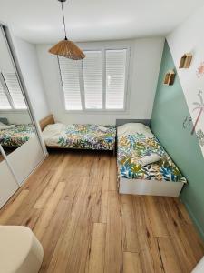 Appartements Le Bateau perche - Proche Autoroute : photos des chambres